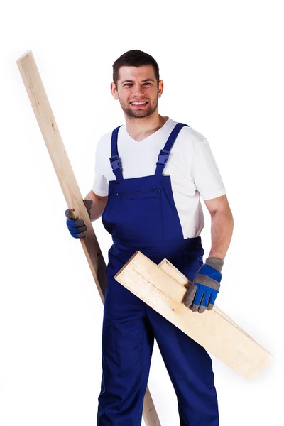 Handyman med golvpaneler — Stockfoto