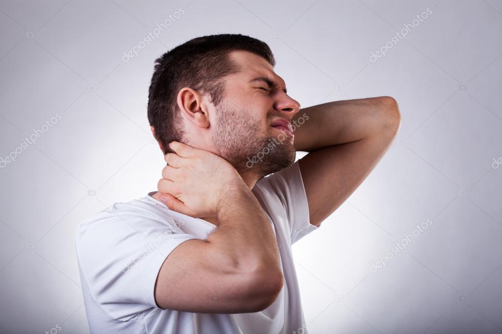 Young man with neck ache