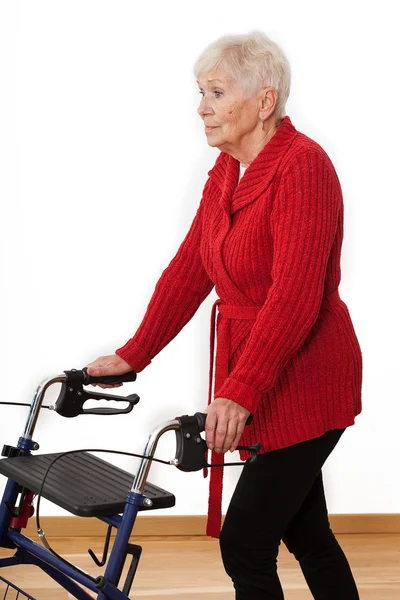 Woman with a walker — Stock Photo, Image