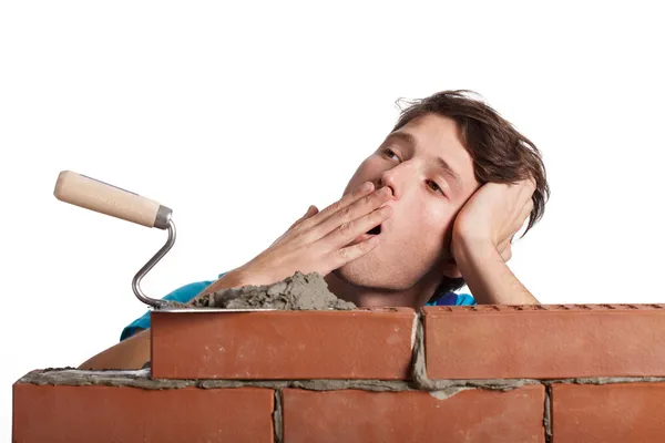 Bored bricklayer yawning — Stock Photo, Image