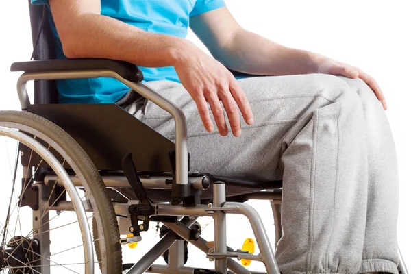 Sitting on wheelchair — Stock Photo, Image