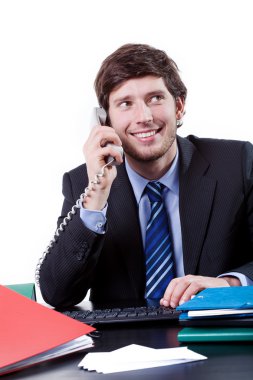 Businessman talking by phone clipart