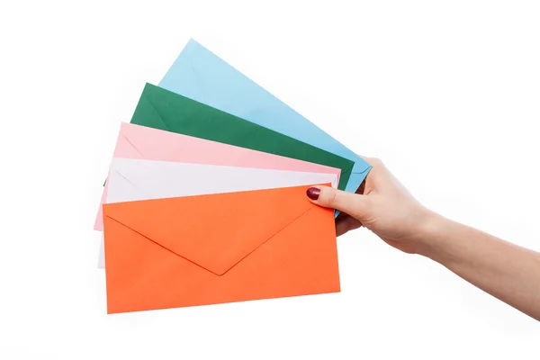 Hand with colourful envelopes — Stock Photo, Image