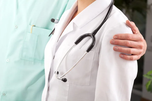 Standing physician couple — Stock Photo, Image