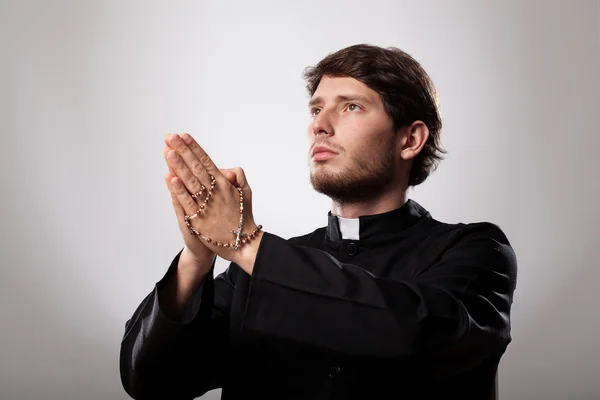 Priest is praying — Stock Photo, Image