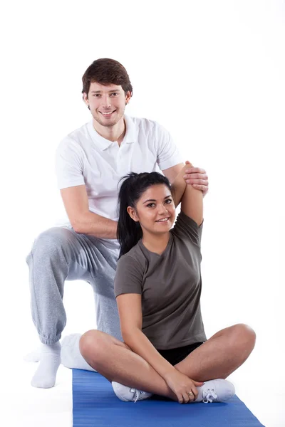 Vrouw met personal trainer — Stockfoto