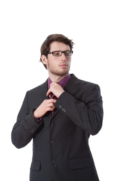 Affärsman kontrollera hans slips — Stockfoto