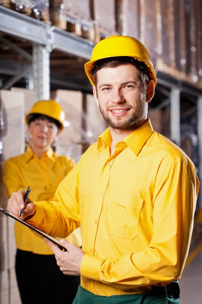 Workers in warehouse — Stock Photo, Image