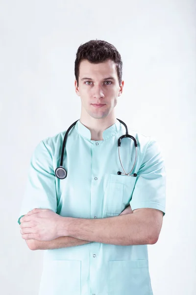 Doctor standing with arms crossed — Stock Photo, Image