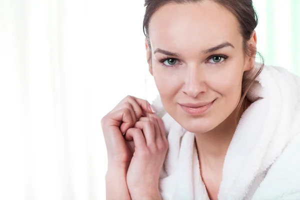 Woman wearing bathrobe — Stock Photo, Image