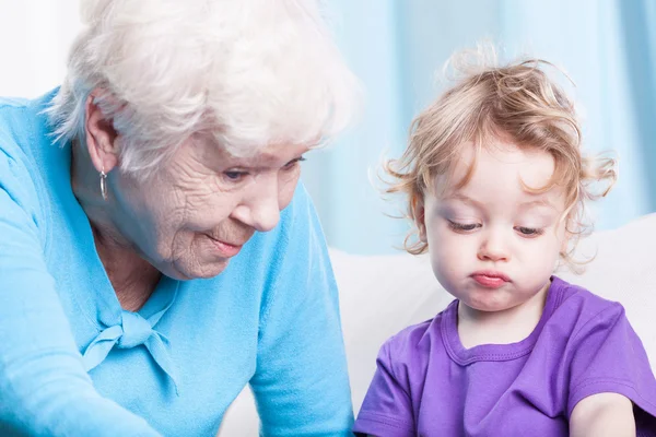 Grandmother playing with grandson — Stock Photo, Image