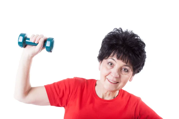 Elderly woman with a dumb-bell — Stock Photo, Image