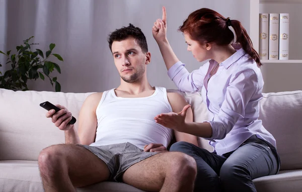 Woman threatening husband — Stock Photo, Image