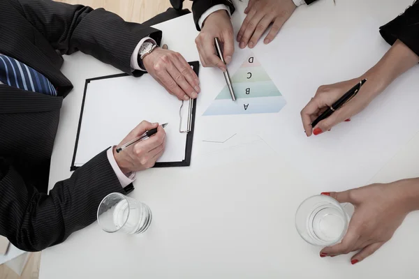 Business meeting with three employees — Stock Photo, Image