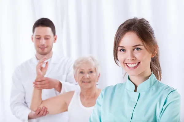 Female therapist smiling — Stock Photo, Image