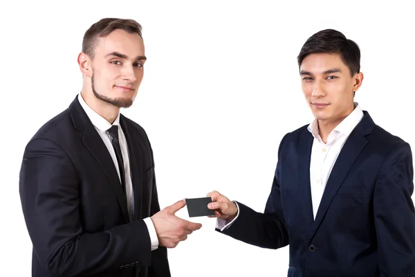 Business partners exchanging business cards — Stock Photo, Image