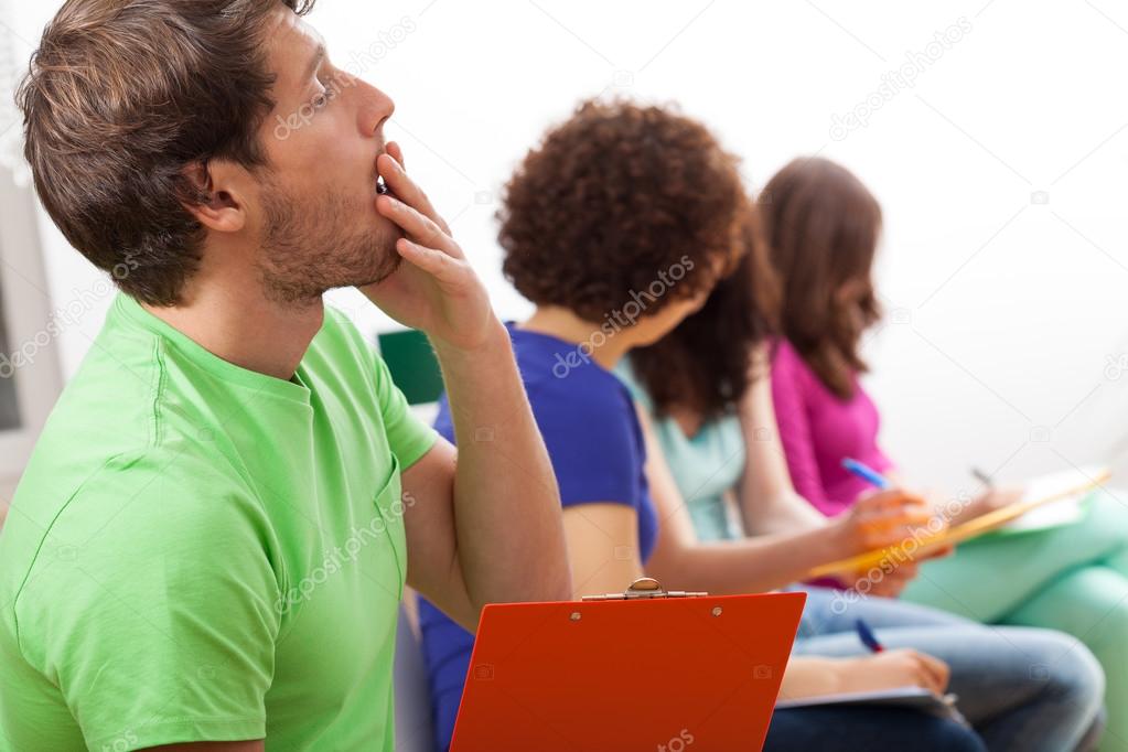 Yawning student during lecture