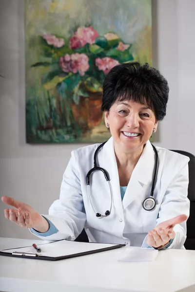 Friendly doctor in surgery — Stock Photo, Image