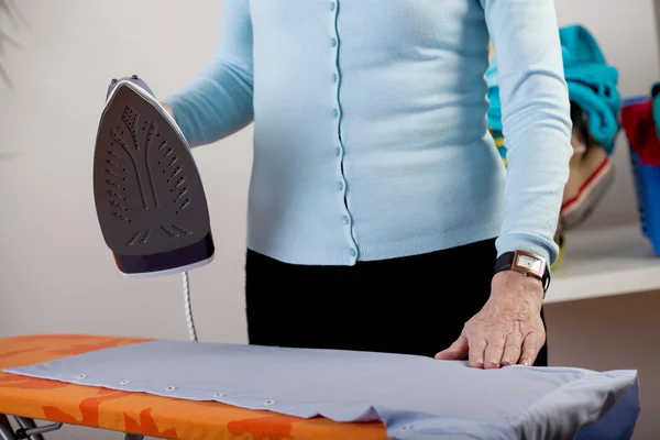 Ironing clothes closeup — Stock Photo, Image