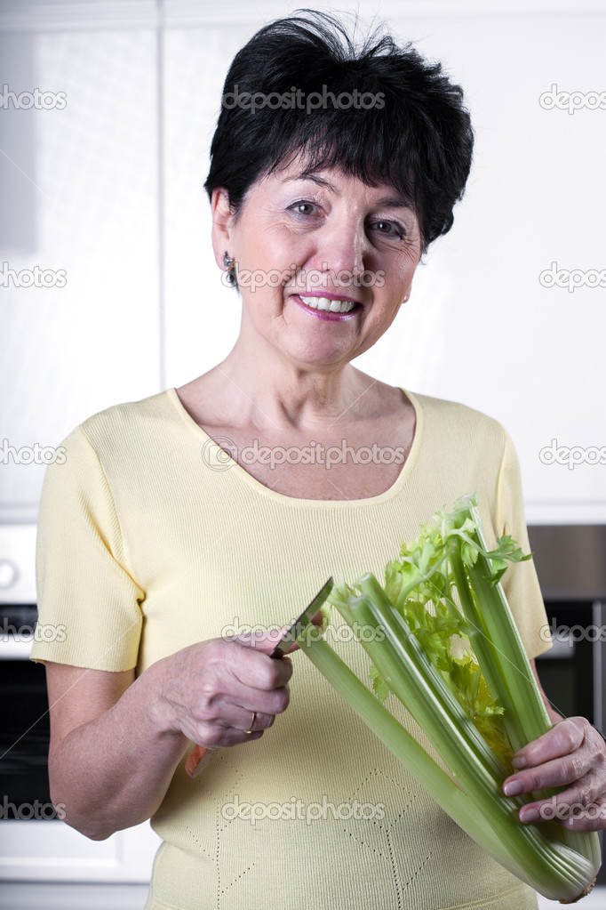 Happy woman with a veggie