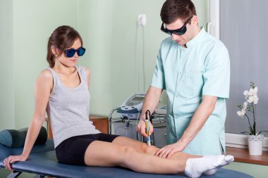 Laser physiotherapy clipart