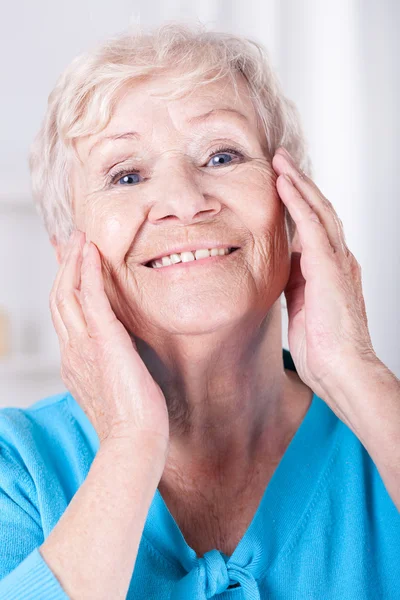 Elderly woman's skin care — Stock Photo, Image