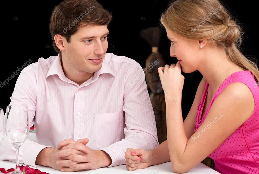 Happy couple at restaurant