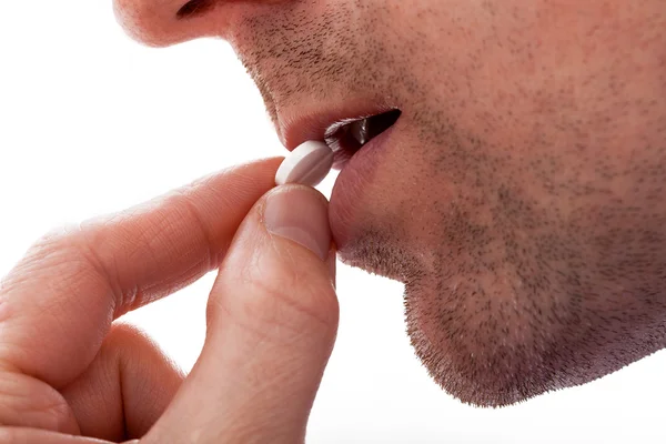 Man with pill — Stock Photo, Image