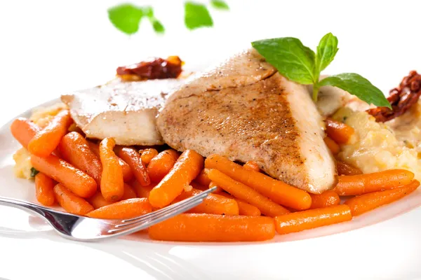 Cooked meat with carrots — Stock Photo, Image