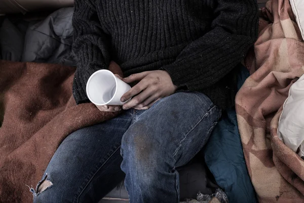 Homeless man collecting money — Stock Photo, Image