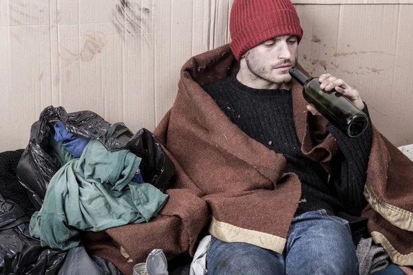 Homeless drinking cheap wine — Stock Photo, Image