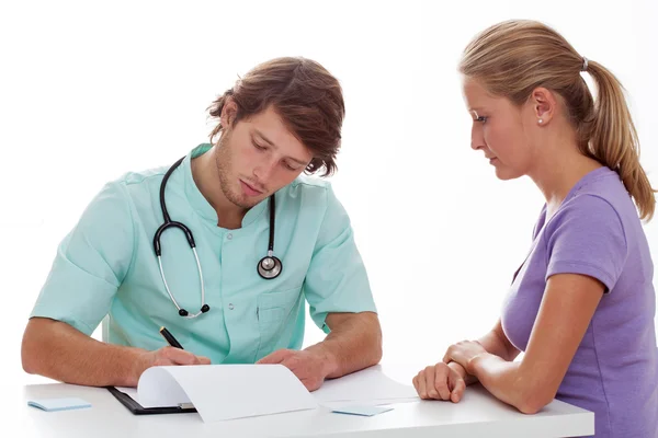 Doctor making notes — Stock Photo, Image