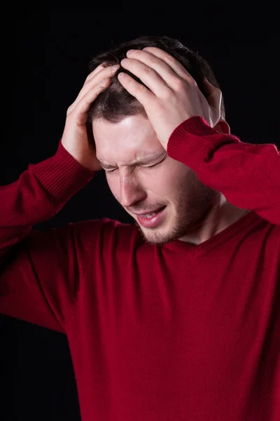 Mann leidet unter Kopfschmerzen — Stockfoto