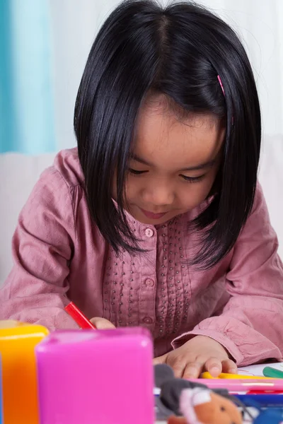 Girl with crayons — Stock Photo, Image