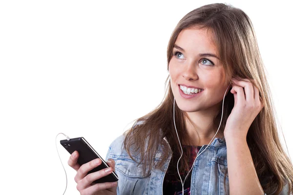 Talking on mobile phone in an earphones — Stock Photo, Image