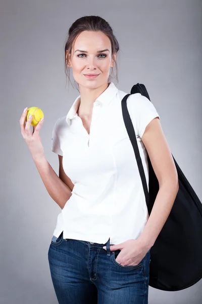 Woman going to tennis training — Stock Photo, Image