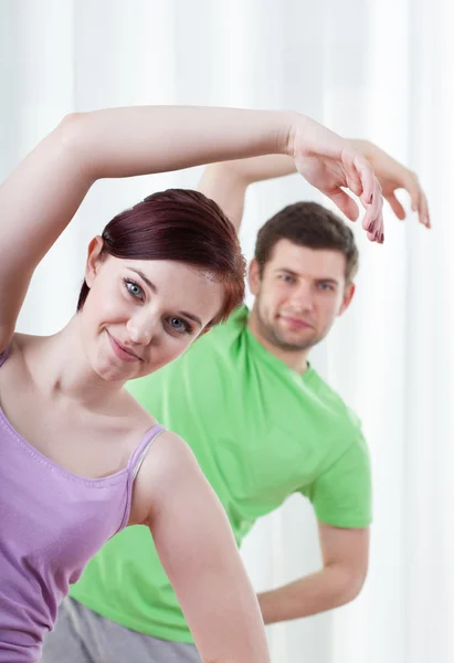 Young couple exercising — Stock Photo, Image