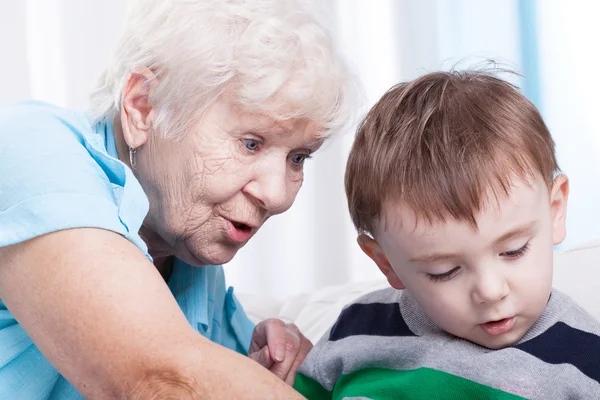 Glad grandma with little boy — Stock Photo, Image