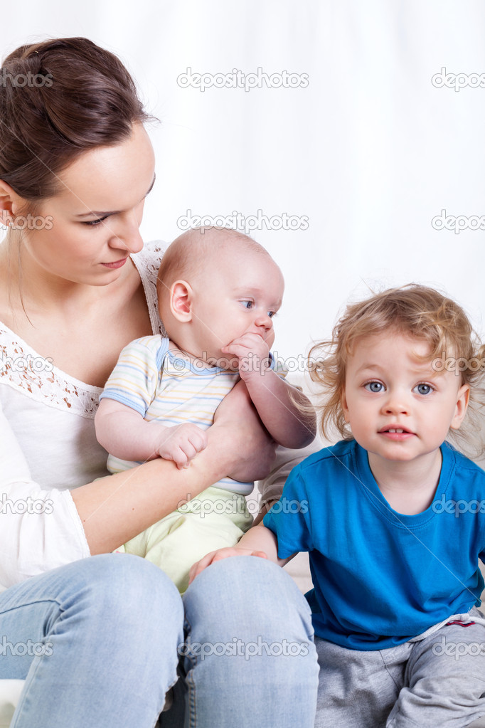 Mum sitting with children