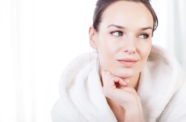 Thoughtful woman after treatments in spa — Stock Photo, Image