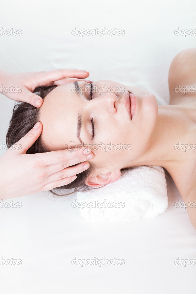 Woman during face massage