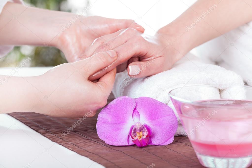 Lady during hand massage