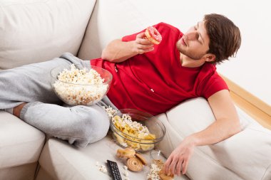 man op de Bank met traktaties