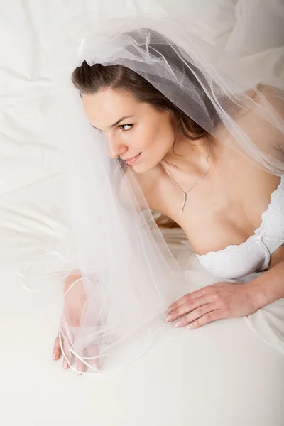 Bride waiting for a partner during wedding night — Stock Photo, Image
