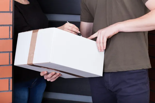 Accepting a post office package — Stock Photo, Image