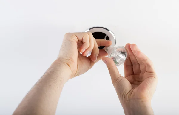 Fixing a bulb — Stock Photo, Image