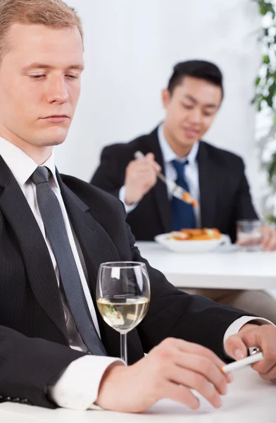 Frokosttid i selskab - Stock-foto