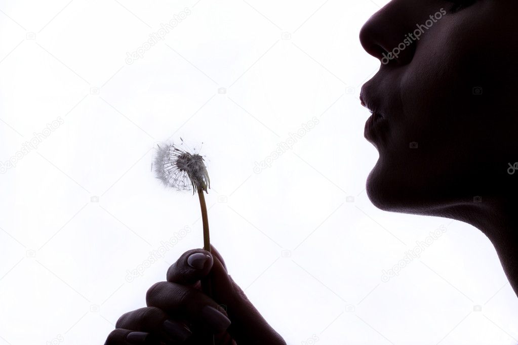 Woman with dandelion