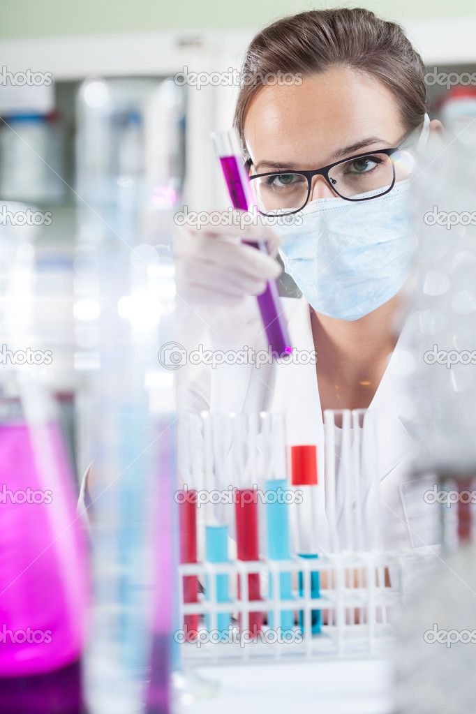 Lab technician holding a test tube