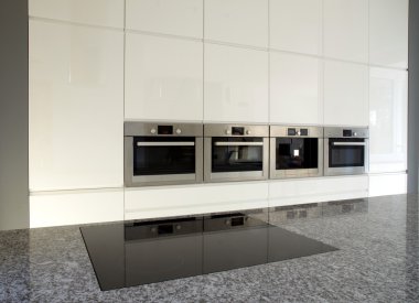 Modern built-in kitchen in white clipart